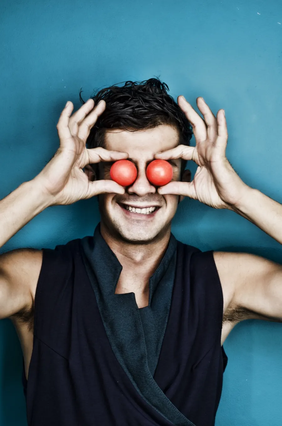 Playful studio portrait with billiard balls
